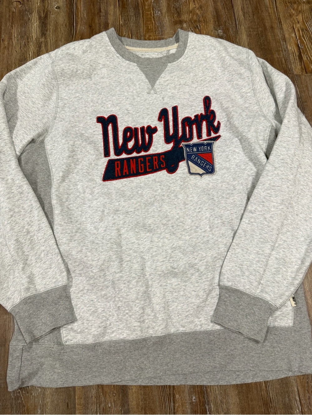 NHL New York Rangers hockey gray crewneck sweatshirt with blue and red logo